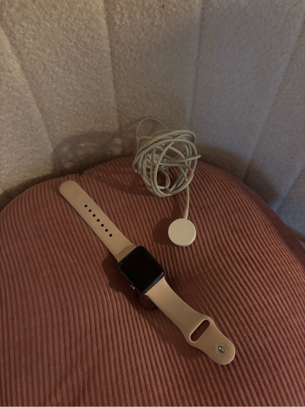 Apple Watch in Light Pink Silicone Band with White Magnetic Charger